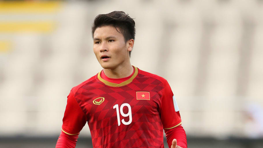 Nguyễn Quang Hải khi thi đấu cho đội tuyển bóng đá quốc gia Việt Nam